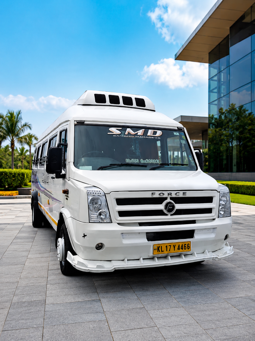 SMD Force Traveller employee transport vehicle at a corporate facility