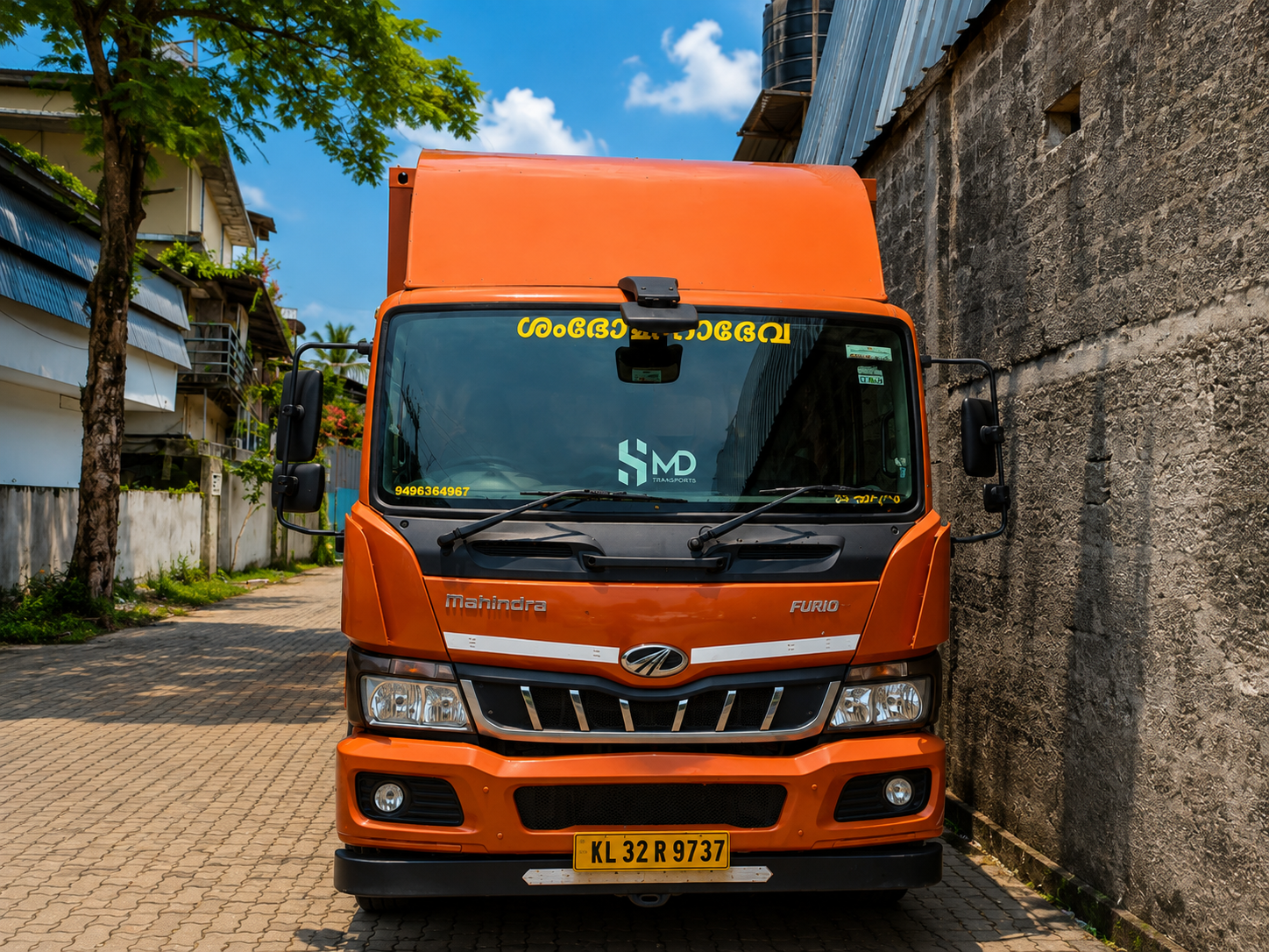 Orange SMD Mahindra cargo truck